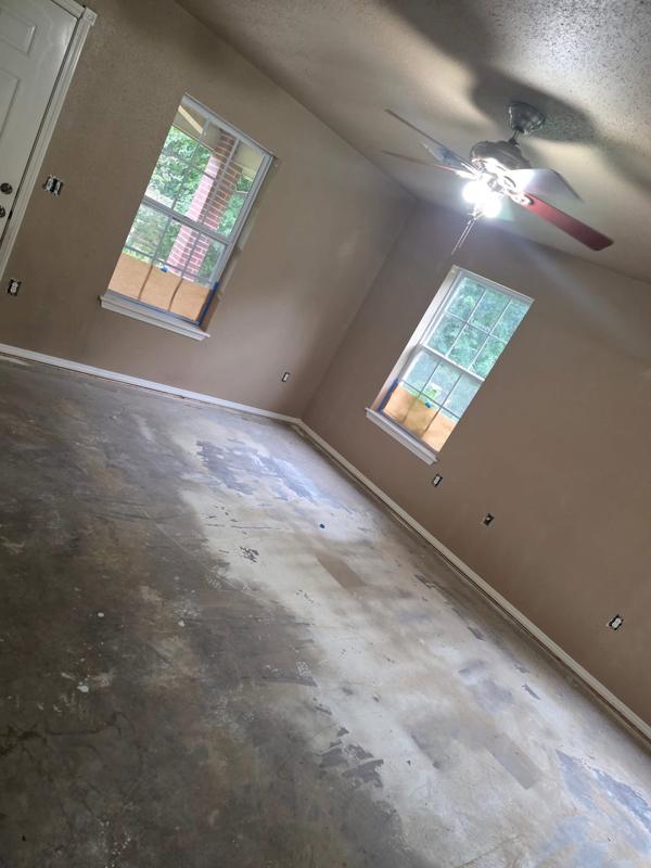 Bedroom repainted, floor prepped for new flooring