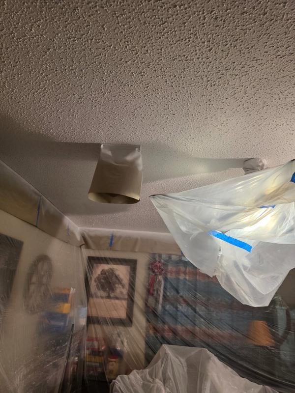 Ceiling texture going on over a masked room